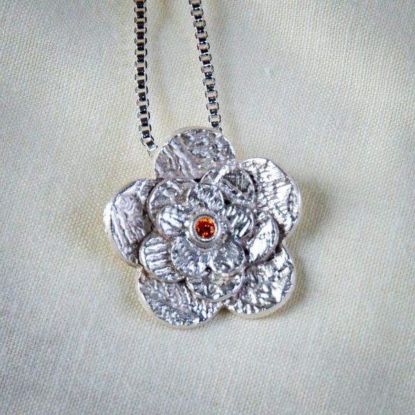 Flower Pendant with orange centre stone.(FSP5)