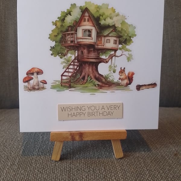 Happy birthday card with a tree house as the picture