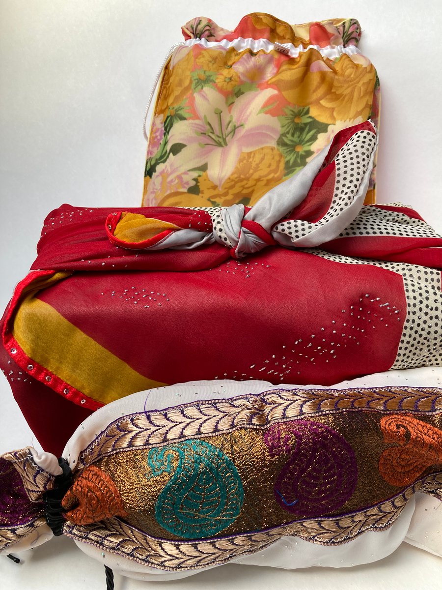 Three gift bag wraps made from sari fabric