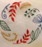 Cushion cover embroidered with a beautiful circle of leaves and flowers.  - Image 2