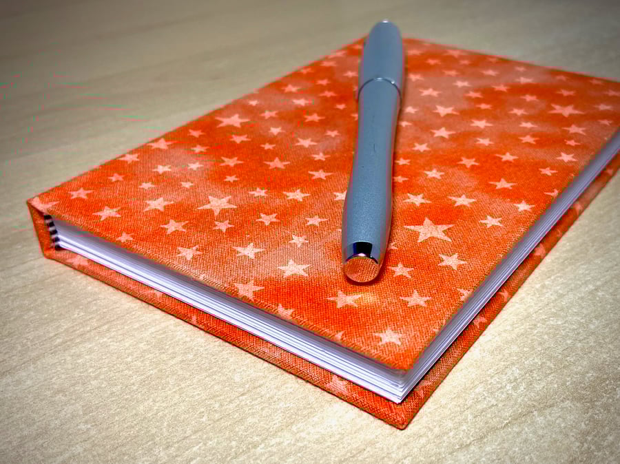 A6 Hardback Lined Notebook with full cloth orange star cover