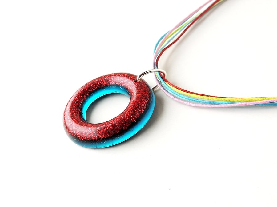 Red and Blue Resin Pendant on Rainbow Cord Necklace (010)
