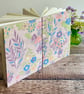 Perfectly Imperfect Coptic Stitch Journal covered with Upcycled Kimono Silk