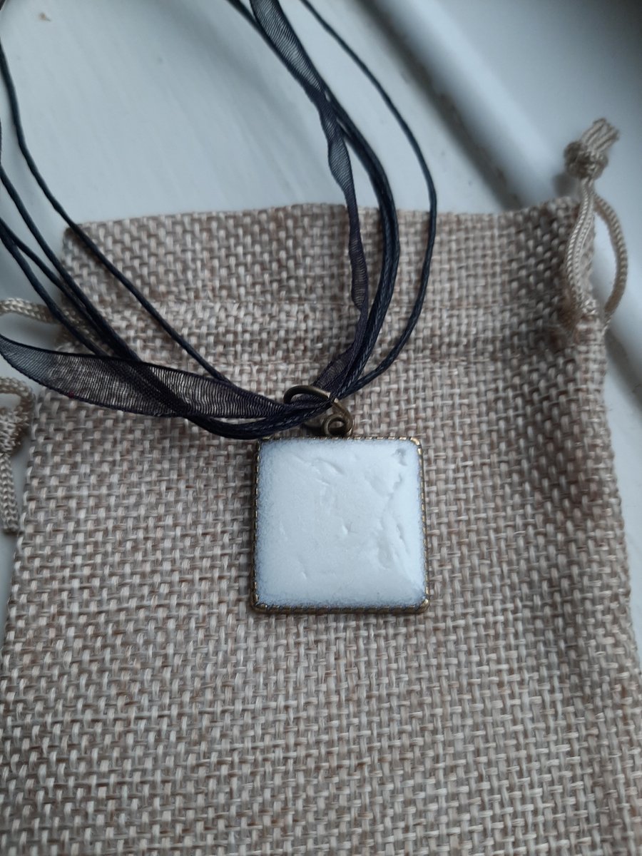 Unique  white square crackled effect resin pendent with a ribbon necklace 