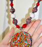 Vintage-Inspired Necklace with a Unqiue Oval Pendant Design & Marbled Beads