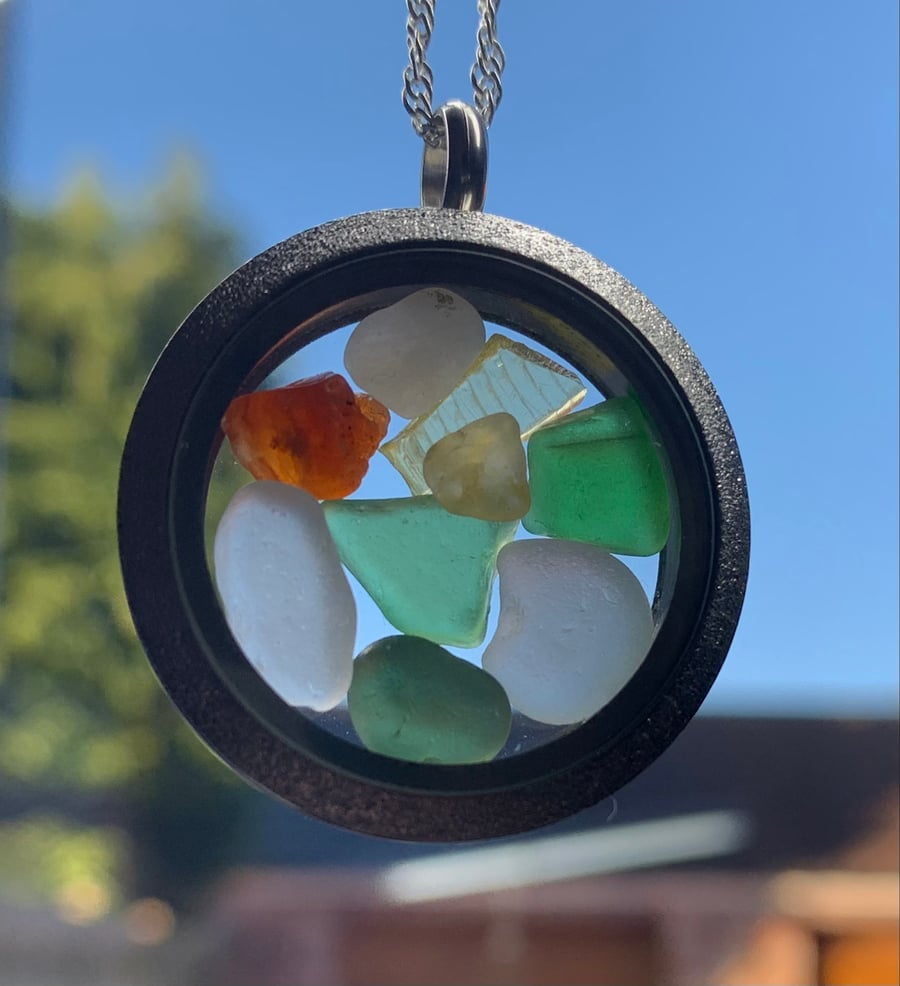 Frosted stainless steel locket filled with seaglass pieces