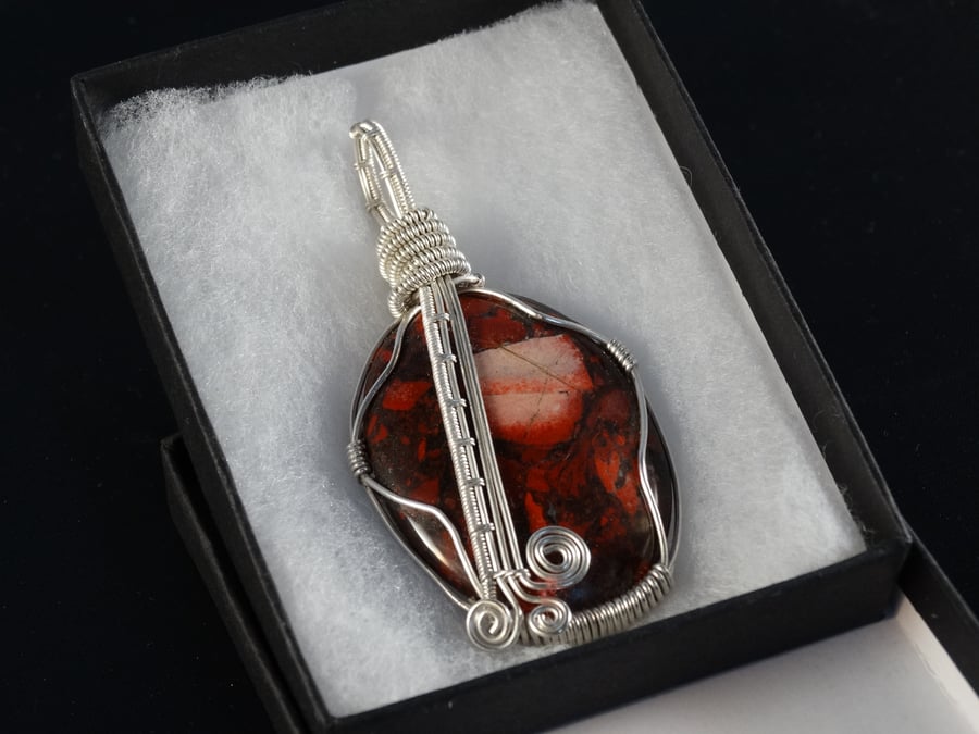 Red Jasper crystal wrapped in sterling silver wire