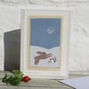 Miniature hand-stitched scene of a leaping hare and moon with berries