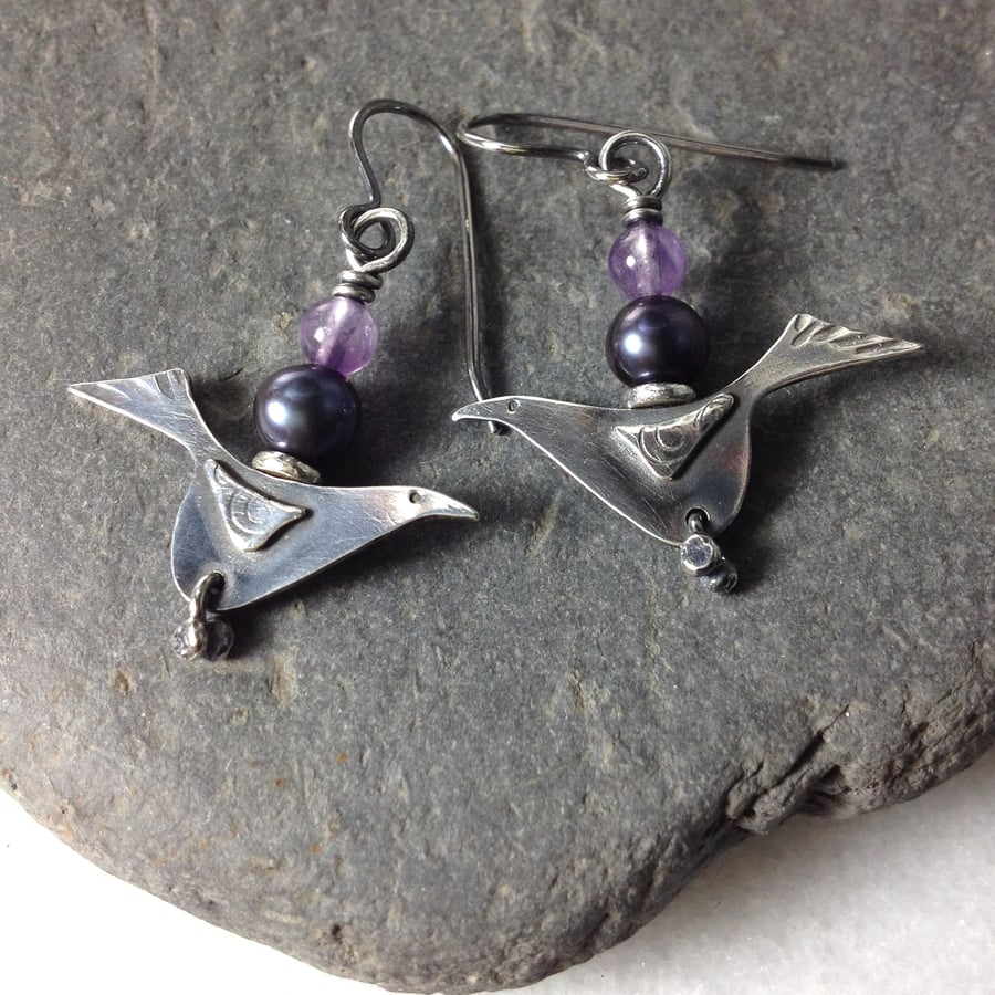 silver blackbird earrings with black pearl and amethyst.