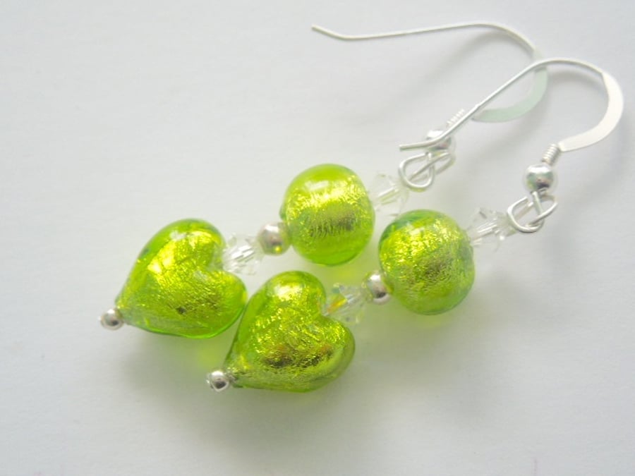 Green handmade  Murano glass heart earrings with sterling silver hooks.