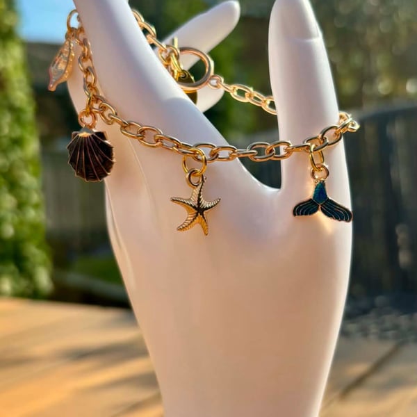 Gold Tone Charm Bracelet