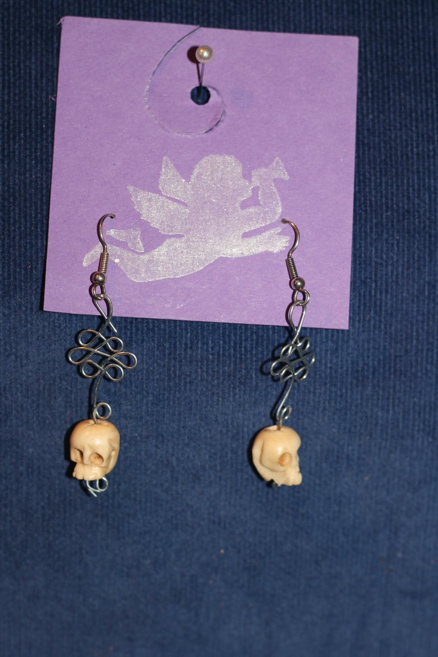 Metal work and skull bead earrings