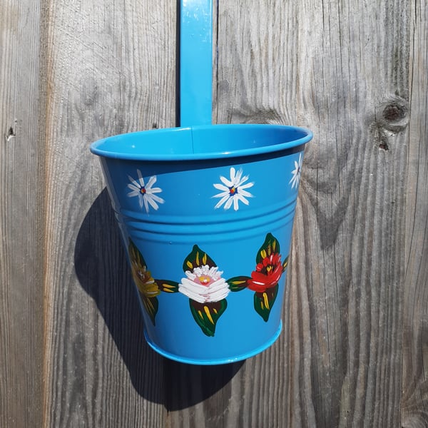 Round hanging planter handpainted with canal art style roses and daisies