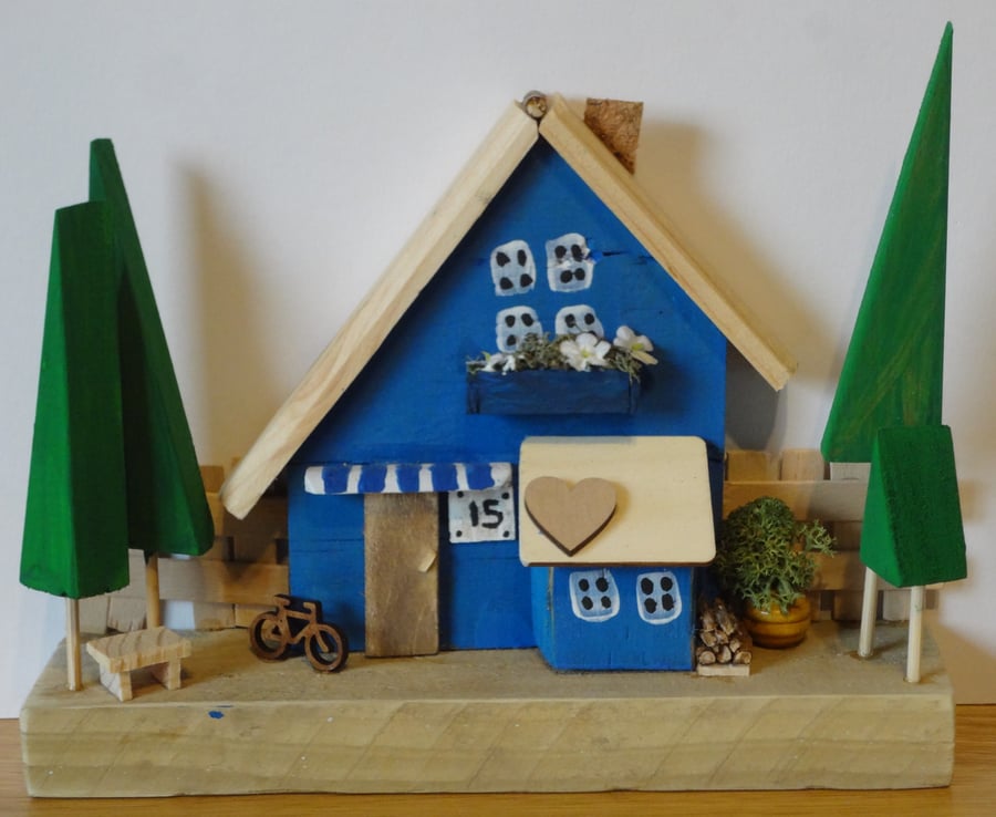 Little blue wooden house