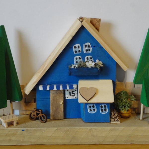 Little blue wooden house