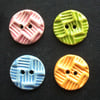 Set of four little handmade ceramic buttons