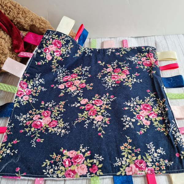 Navy floral taggy blanket 