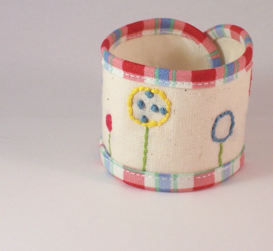 Hand embroidered fabric cuff - Lollipop