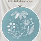 Hand embroidered floral hoop wall hangin in bright white and aqua coastal decor 