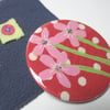 red polka dot mirror and pouch