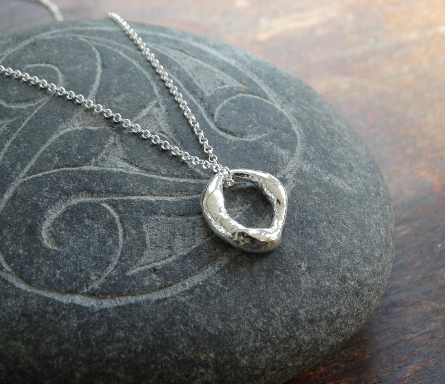 Hagstone charm pendant - recycled silver 