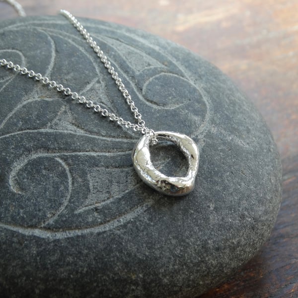 Hagstone charm pendant - recycled silver 