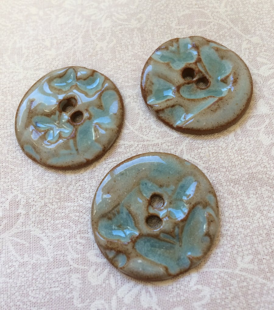 3 blue and brown ceramic butterfly pattern buttons