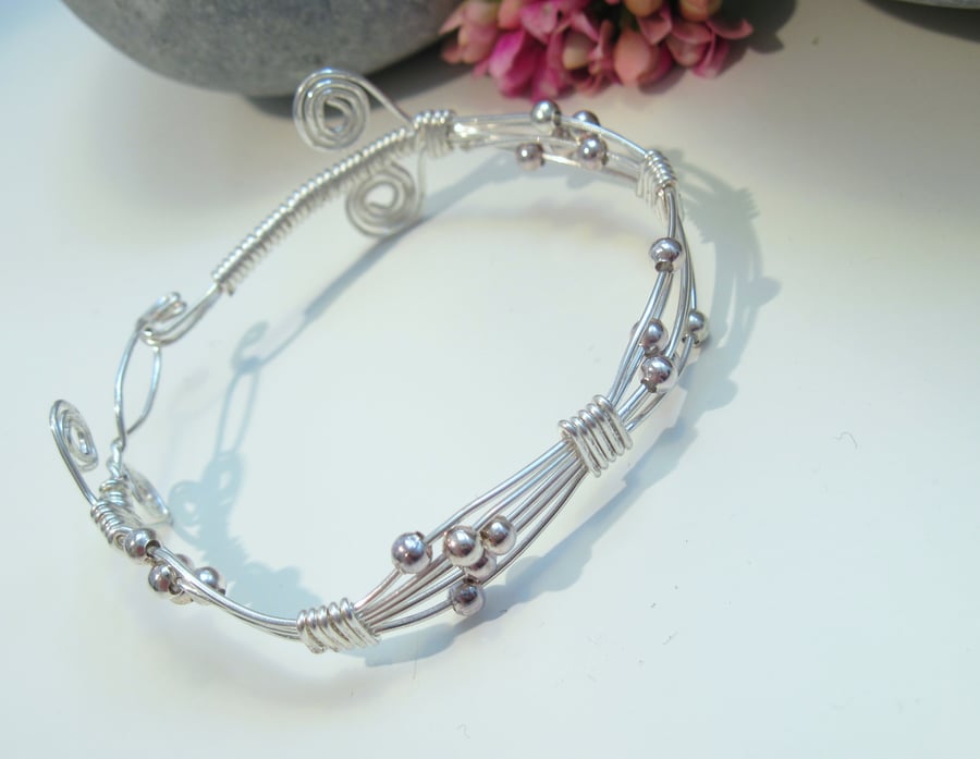 Spiral and bead Bangle
