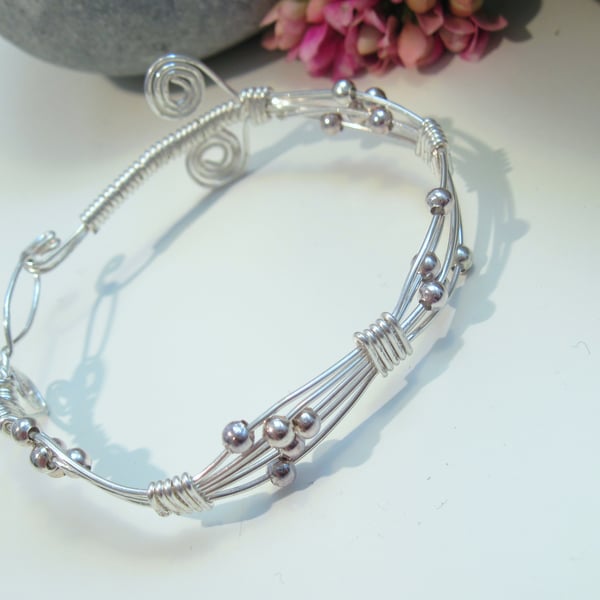 Spiral and bead Bangle