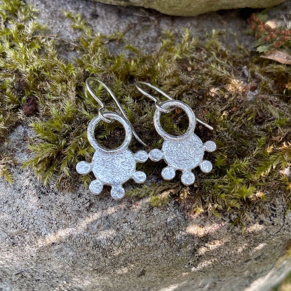 Sterling silver earrings, small dangly earrings, tribal sun