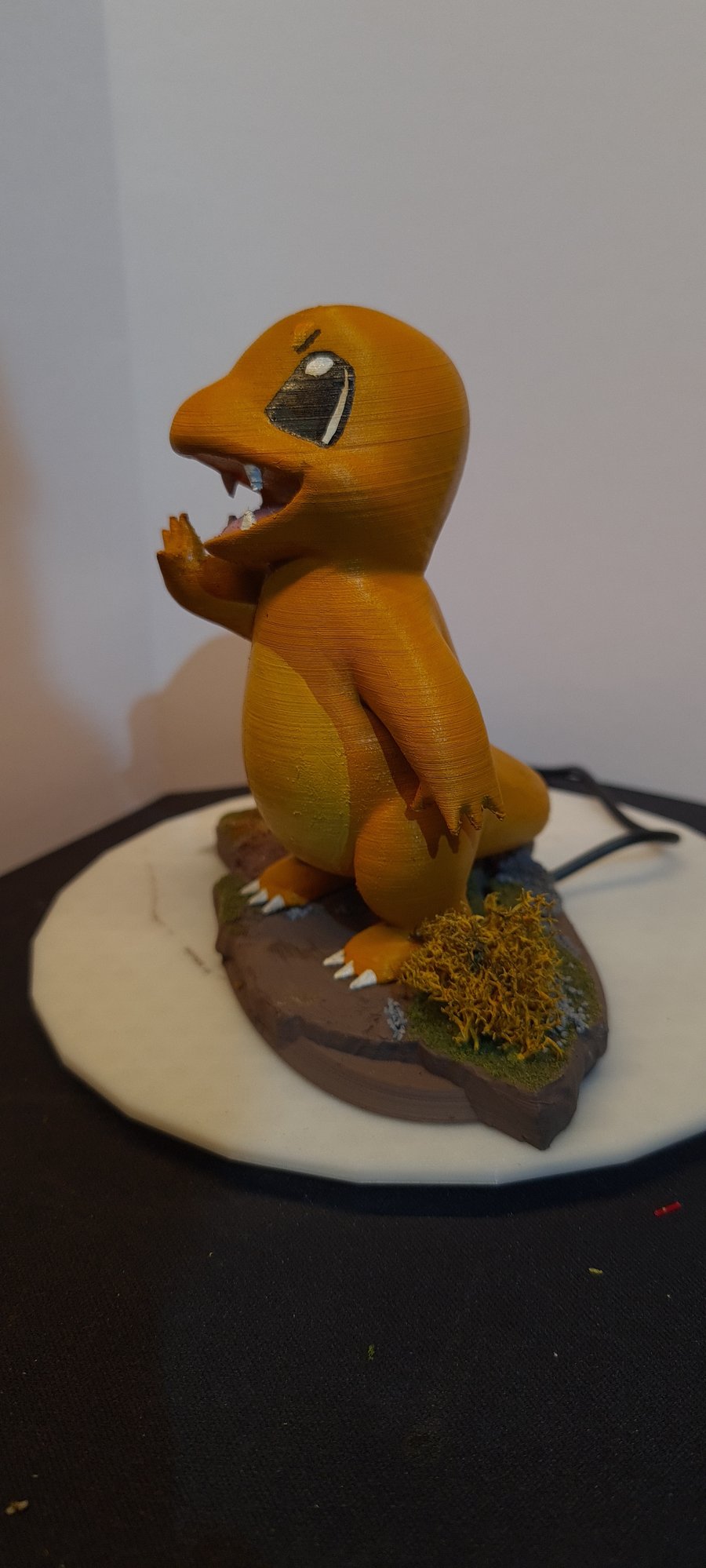 standing charmander with flickering tail