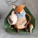Paper mache fox with chicken