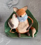 Paper mache fox with chicken