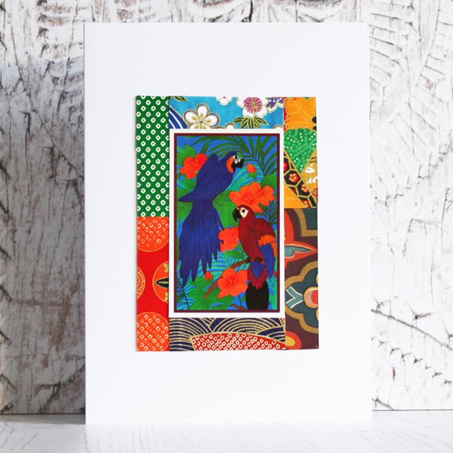 Handmade card. Collage - Macaws and foliage