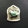 little bird cage brooch