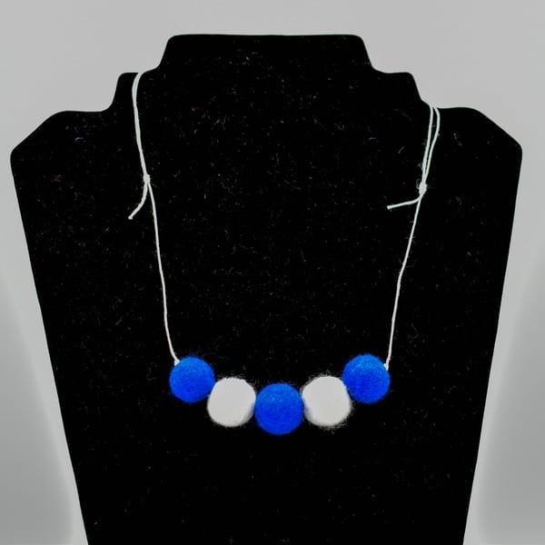 Felted bead necklace in blue and white wool