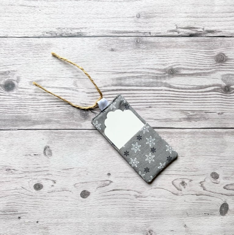 Snowflake Christmas themed silver cotton fabric gift tags with card.