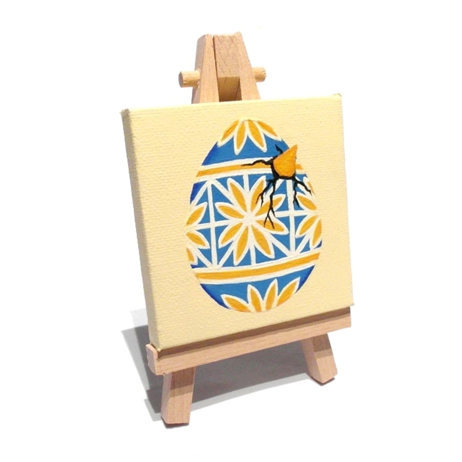 Hatching Easter Egg Mini Painting - blue and yellow pysanka on miniature canvas