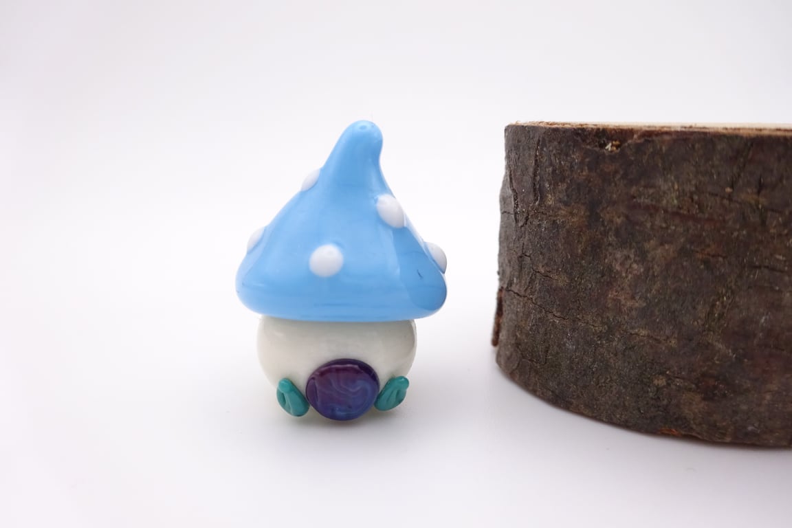 small glass toadstool house