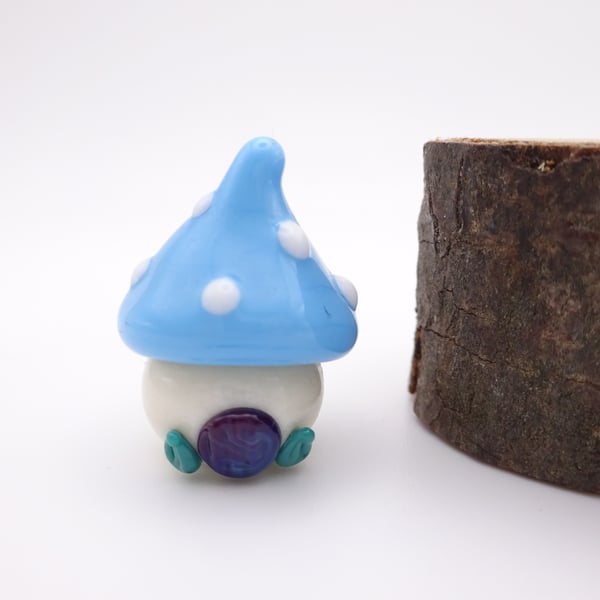 small glass toadstool house