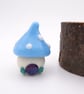 small glass toadstool house - Image 1