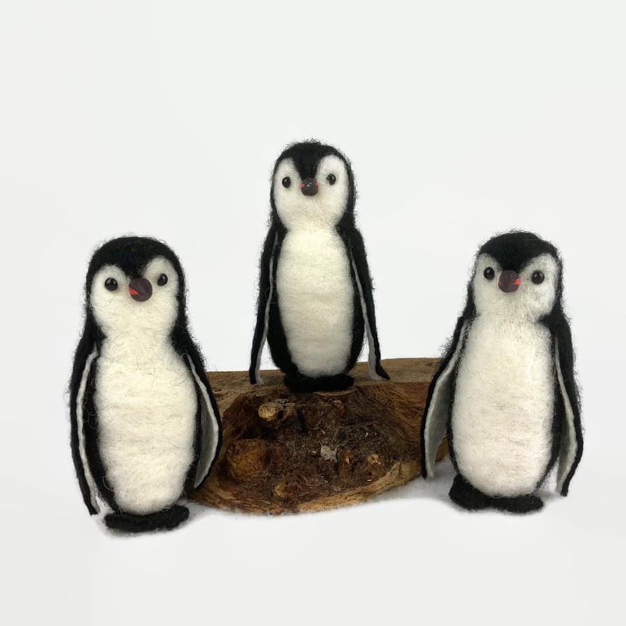 Small needle felted penguin model