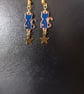 Celestial dark blue and gold cat and star dangle earrings (sun pattern) - Image 5
