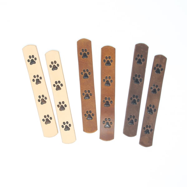 Leather bookmark with hand-painted and embossed paw print motif