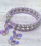 Lilac and shell pearl beaded memory wire bangle with butterfly charms - Image 1