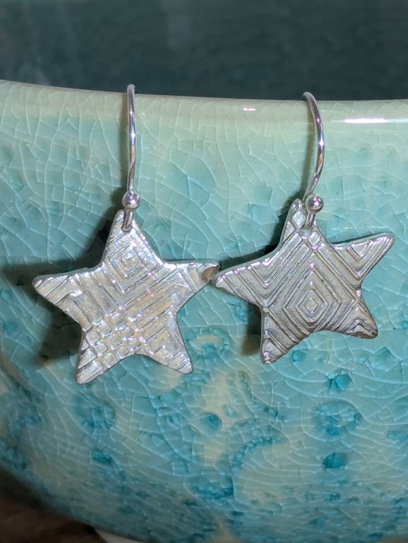 Fine silver star earrings