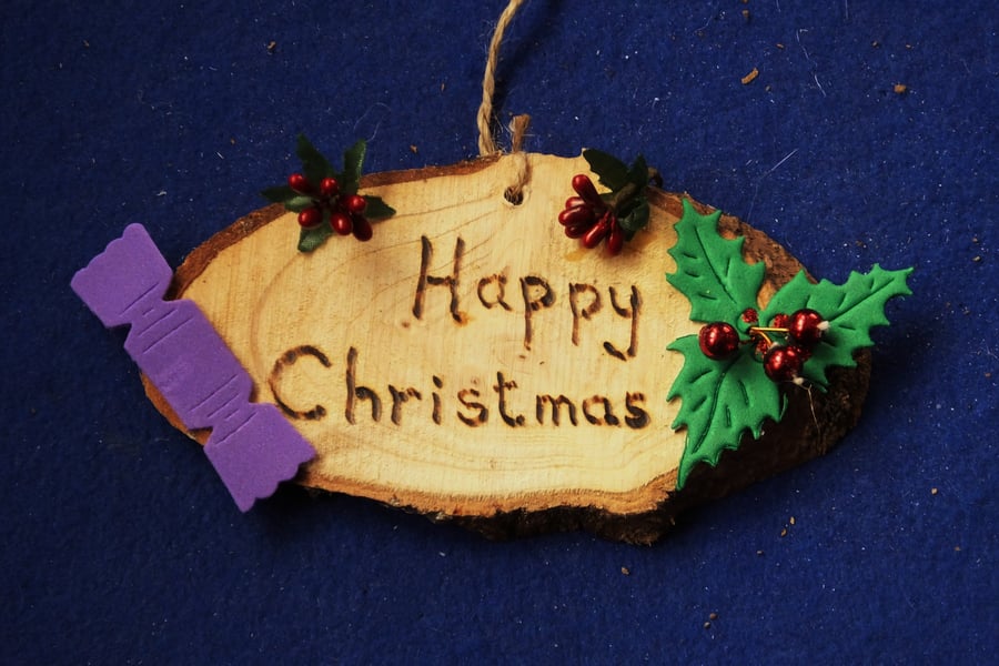 Happy Christmas natural wooden decoration or sign for Christmas time