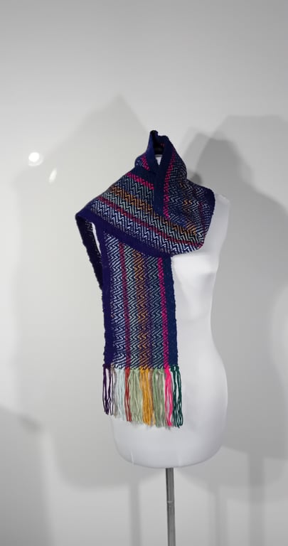 Hand woven Navy Blue Long Scarf With Multicoloured Warp In A Zig Zag Design.