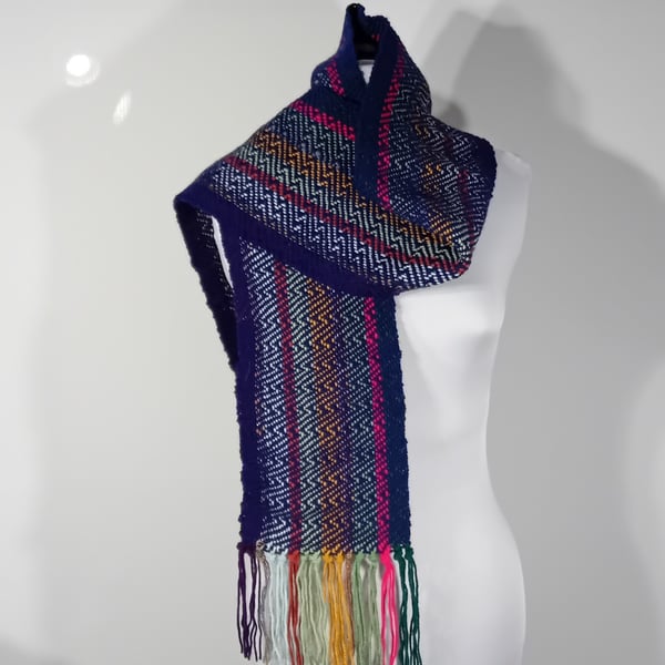 Hand woven Navy Blue Long Scarf With Multicoloured Warp In A Zig Zag Design.
