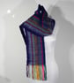 Hand woven Navy Blue Long Scarf With Multicoloured Warp In A Zig Zag Design.